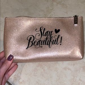 “Stay Beautiful” glittery gold makeup bag